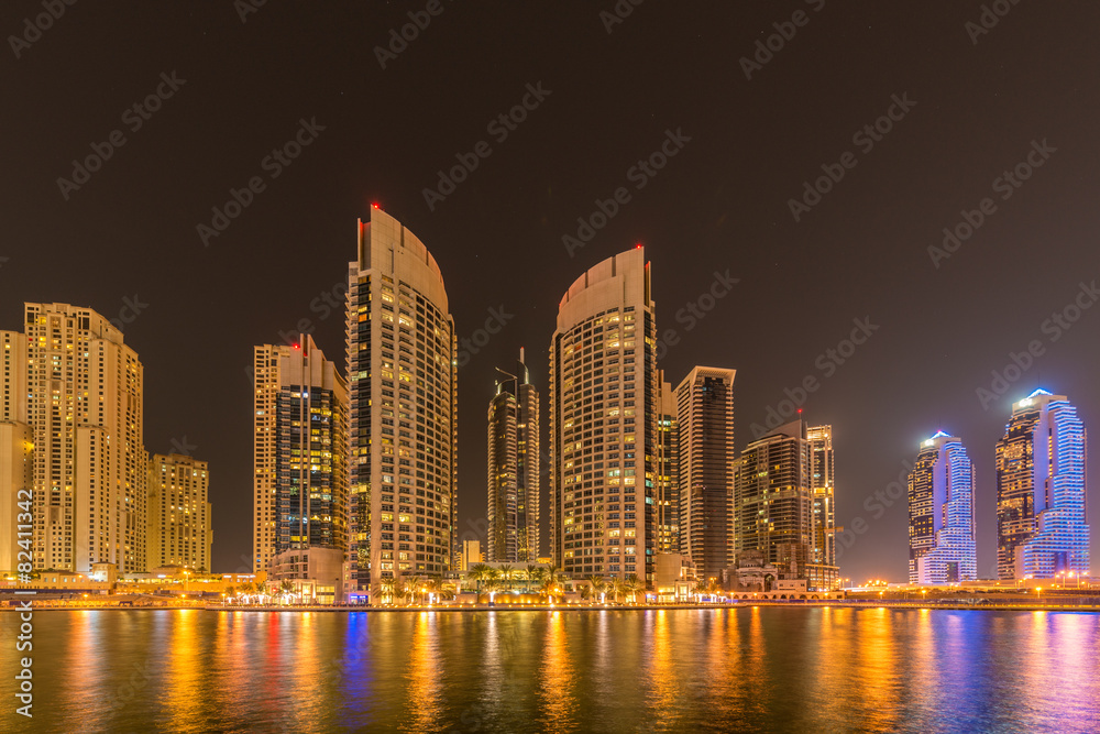 Fototapeta premium Dubai marina skyscrapers during night hours