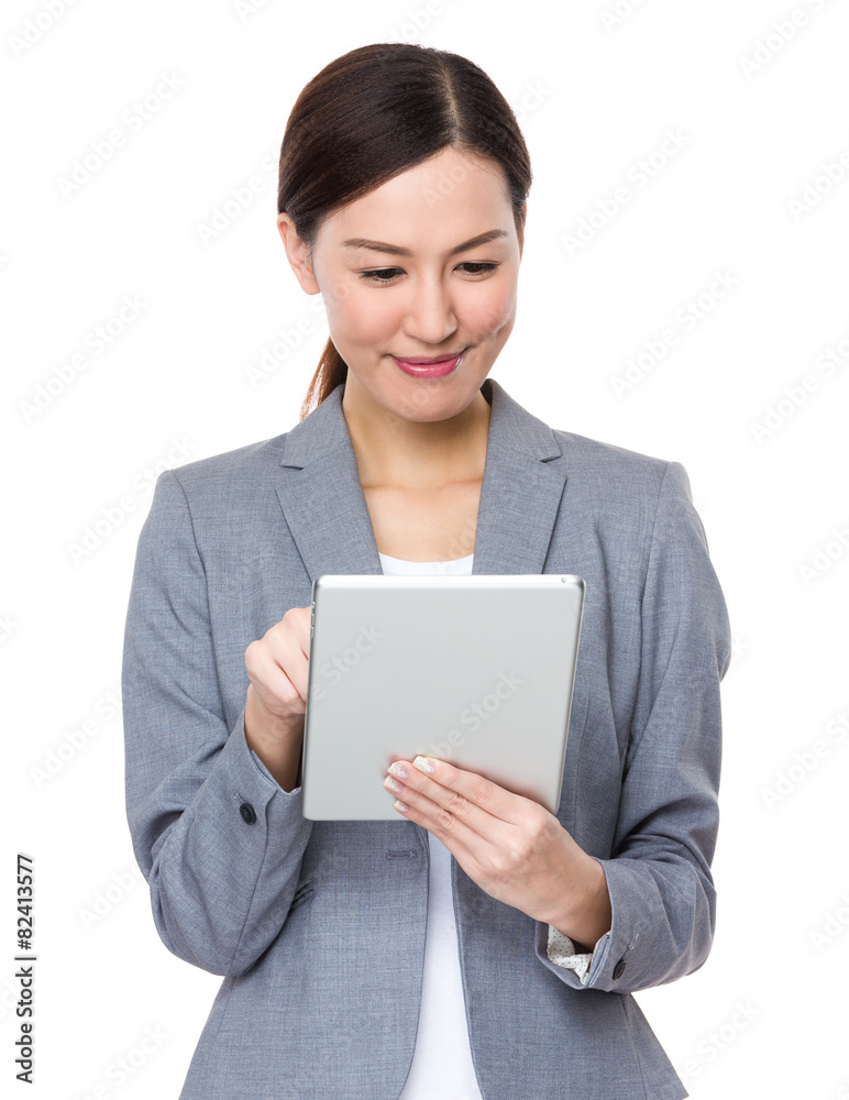 Asian businesswoman use of digital tablet Asian businesswoman use of digital tablet