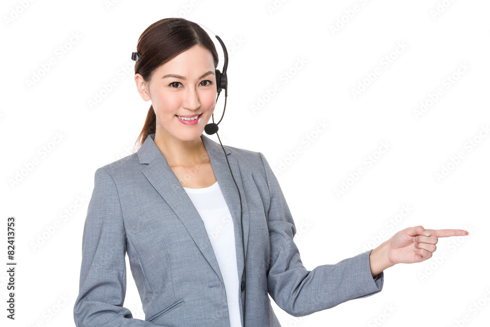 Customer services officer with finger showing something Customer services officer with finger showing something