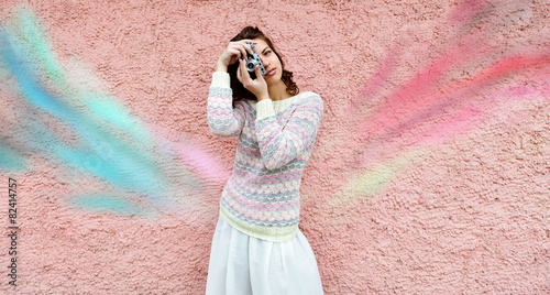 Woman with retro camera ,with colorful wings photo