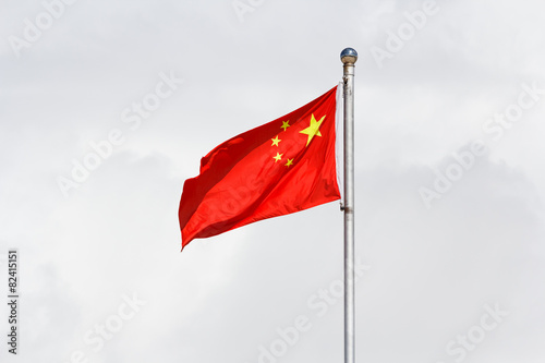 Billede på lærred Waving Chinese flag against cloudy background