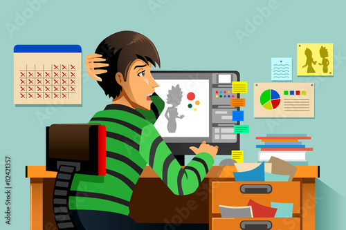Graphic designer working on his computer