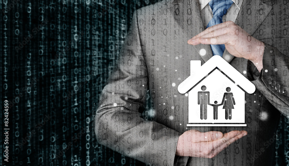 businessman protecting family in home with hands businessman protecting family in home with hands