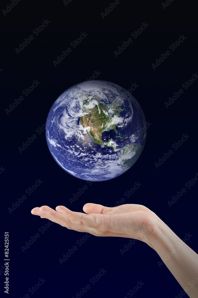 Woman hand holding Earth planet Woman hand holding Earth planet
