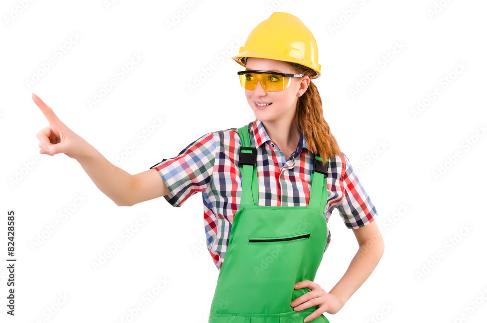 Female handyman in overalls isolated on white Female handyman in overalls isolated on white