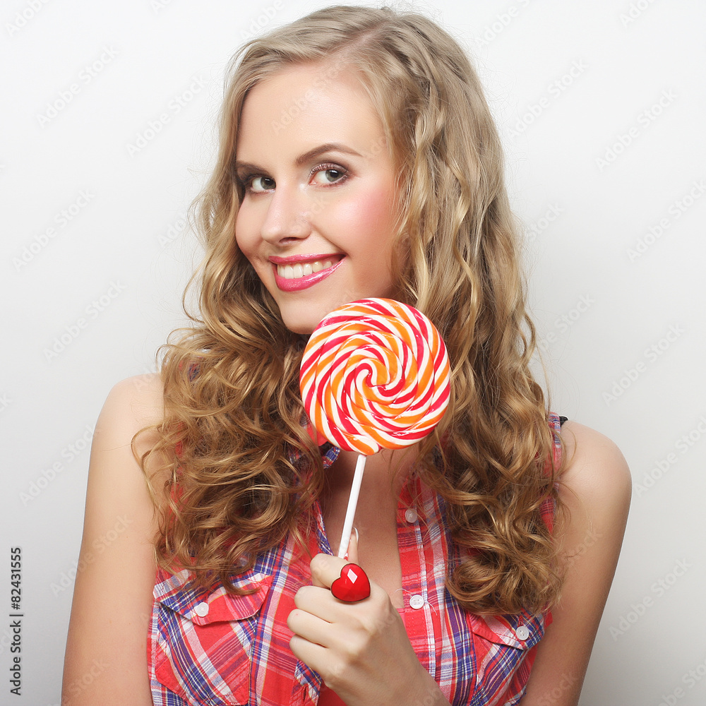 young girl with lolipop