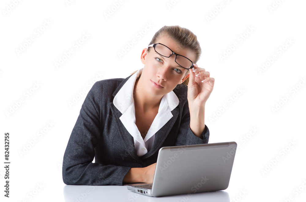 Office manager typing on the laptop isolated on white Office manager typing on the laptop isolated on white