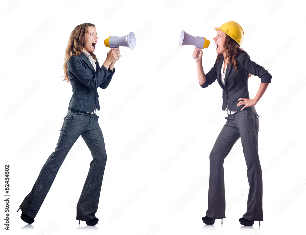 Businessladies with loudspeakers isolated on white Businessladies with loudspeakers isolated on white