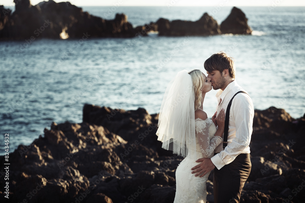 Romantic portrait of kissing a marriage couple Romantic portrait of kissing a marriage couple