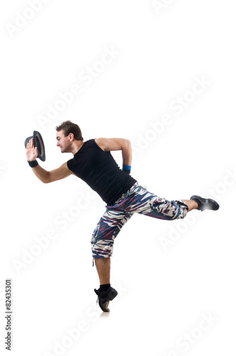 Man dancing dances isolated on white