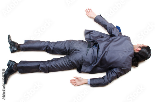 Businessman on the floor isolated on white