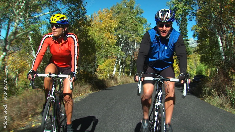 man and woman on bicycles man and woman on bicycles