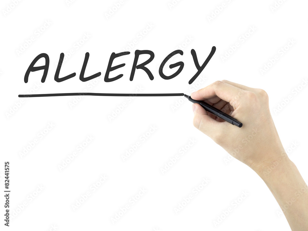 allergy word written by man's hand allergy word written by man's hand