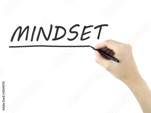 mindset word written by man's hand
