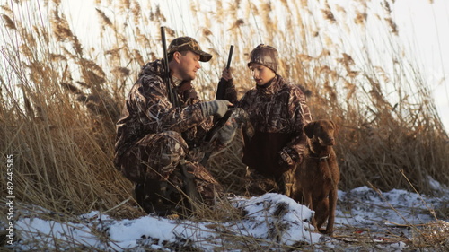 father and son duck hunting