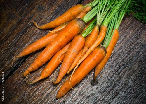 Raw fresh carrots with tails