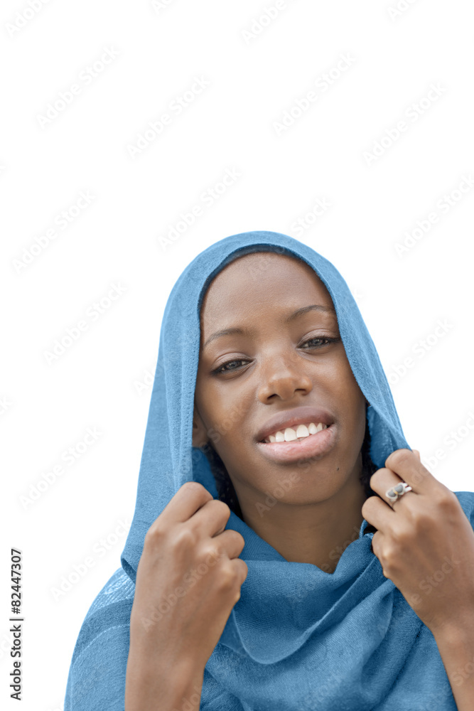 Young Afro beauty wearing a blue headscarf, isolated Young Afro beauty wearing a blue headscarf, isolated