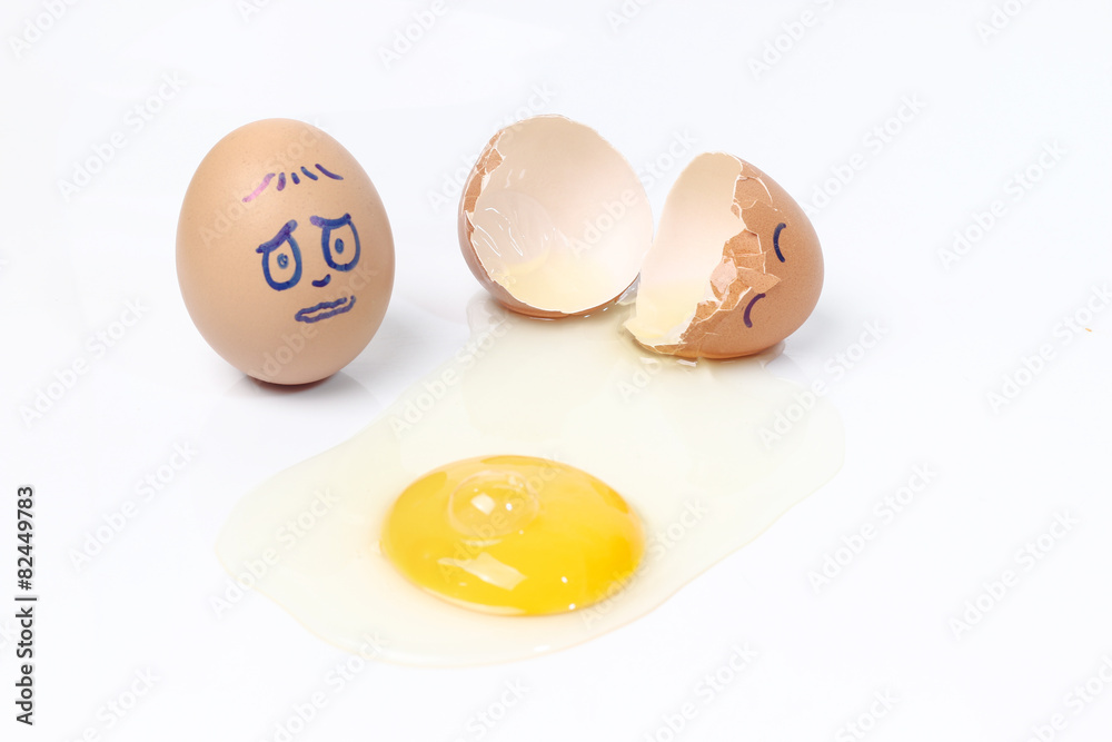 Sad Easter egg with broken one near by