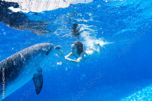 with the dolphins © Andriy Bezuglov