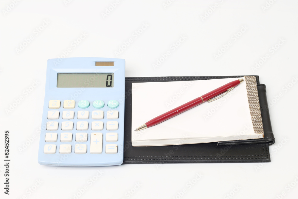 Photo of the Business concept with calculator, pen and notebook Photo of the Business concept with calculator, pen and notebook
