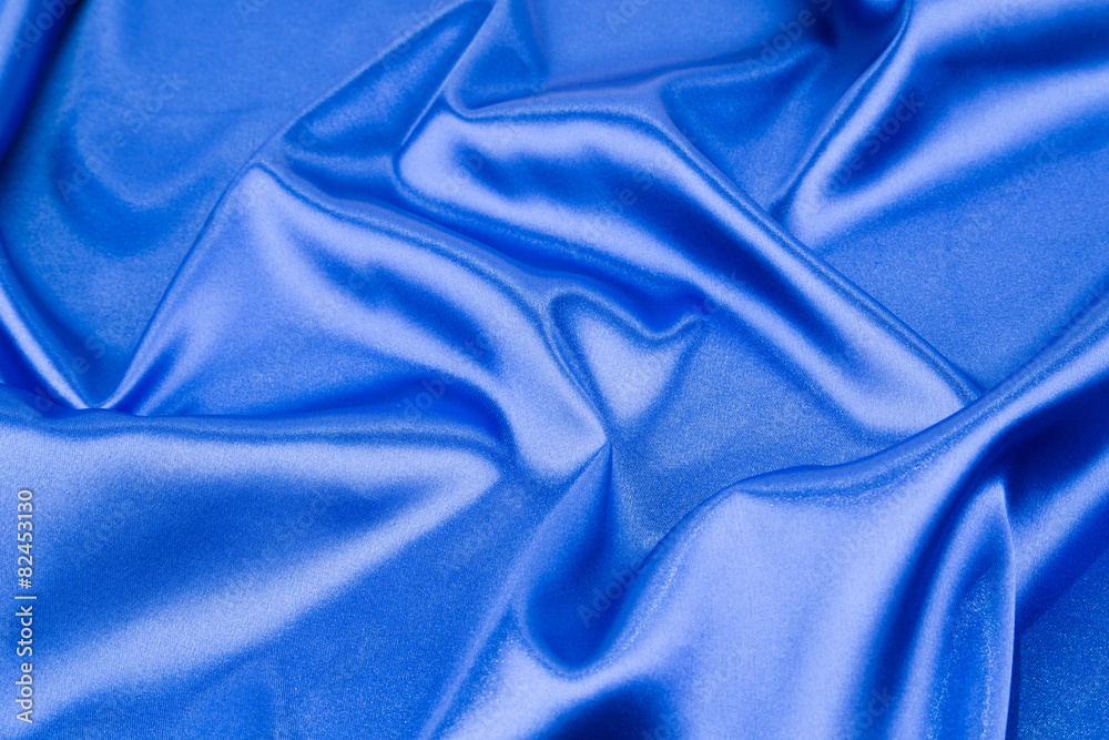 Blue silk background. Close up. Blue silk background. Close up.