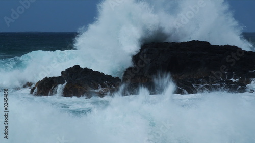waves crashing over rocks