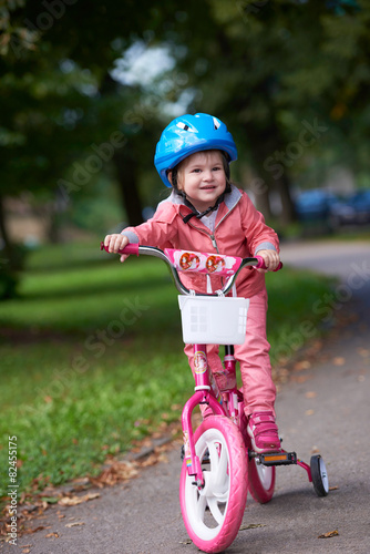little girl with bicycle © .shock