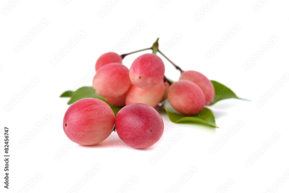 Red karonda fruit isolated on white background.