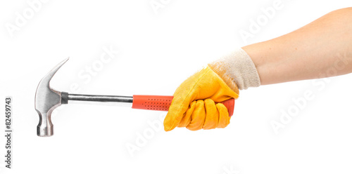 Man's hand in glove holding hammer.