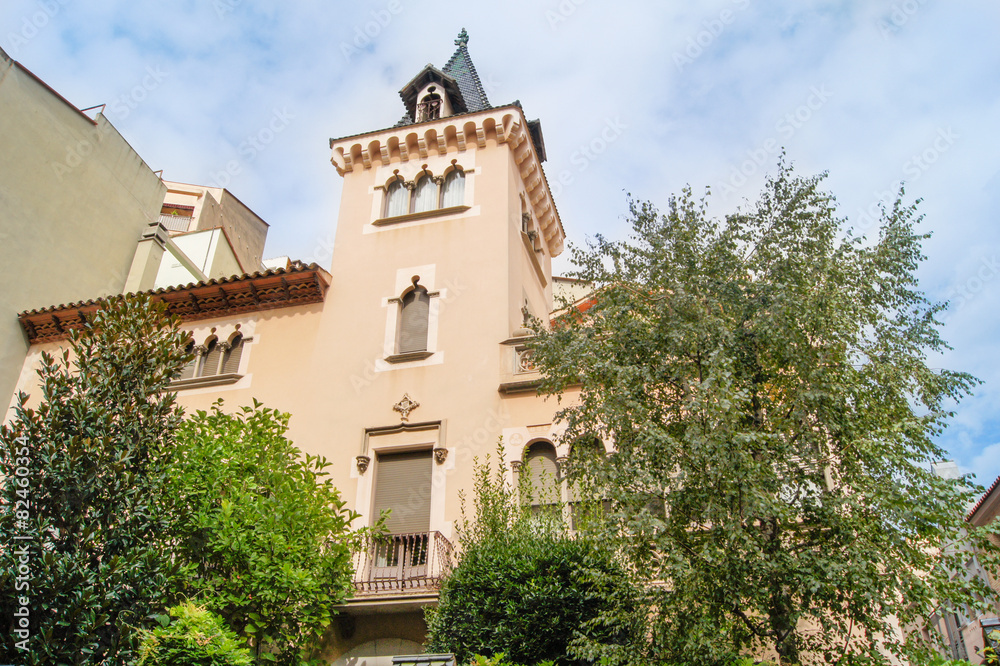 the building of the old city with trees around