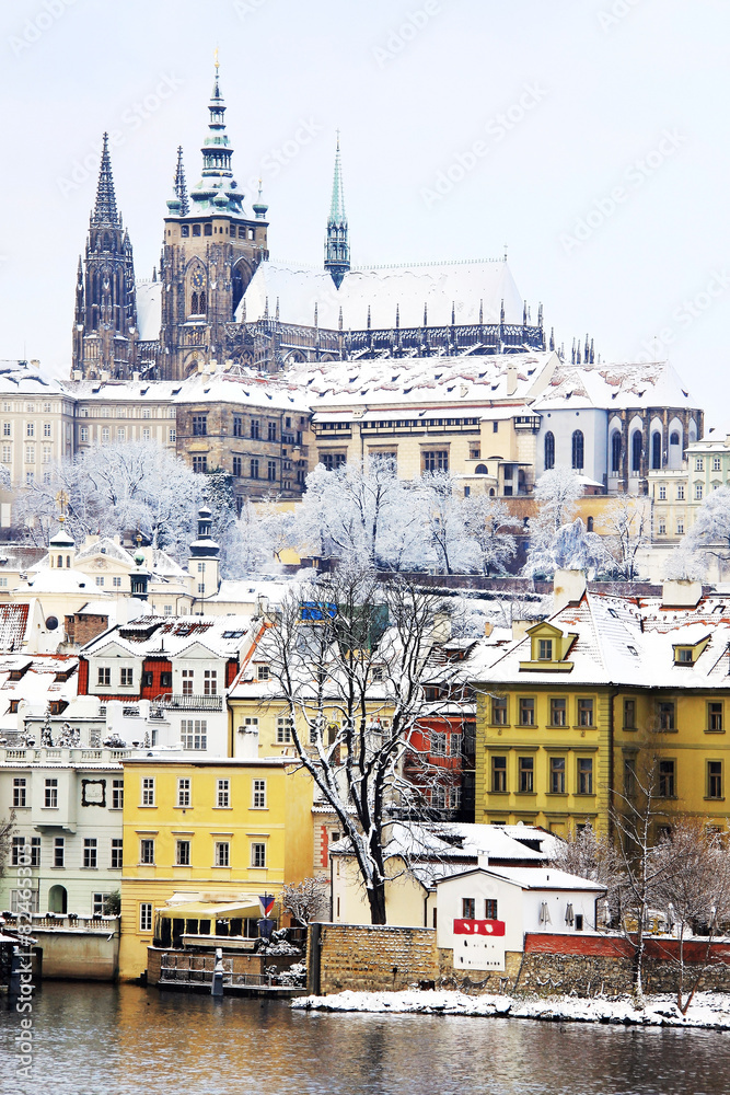 Snowy Prague gothic Castle above River Vltava, Czech Republic