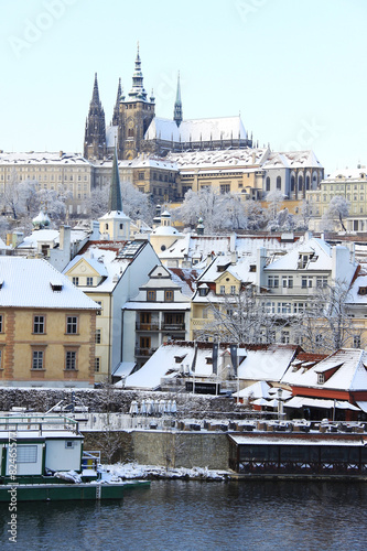 Snowy Prague gothic Castle above River Vltava, Czech Republic