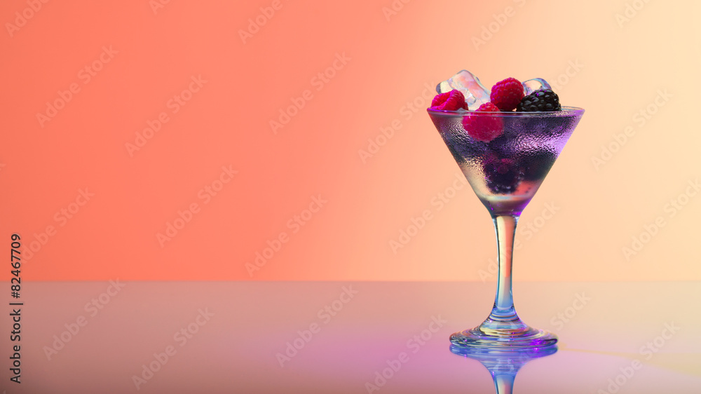 Raspberry and blackberry cocktail with ice, studio shot Raspberry and blackberry cocktail with ice, studio shot