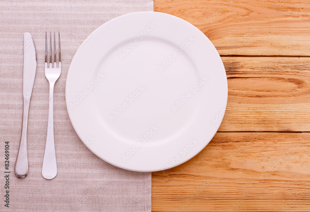 Empty plates, cutlery tablecloth on wooden table for dinner, Empty plates, cutlery tablecloth on wooden table for dinner,