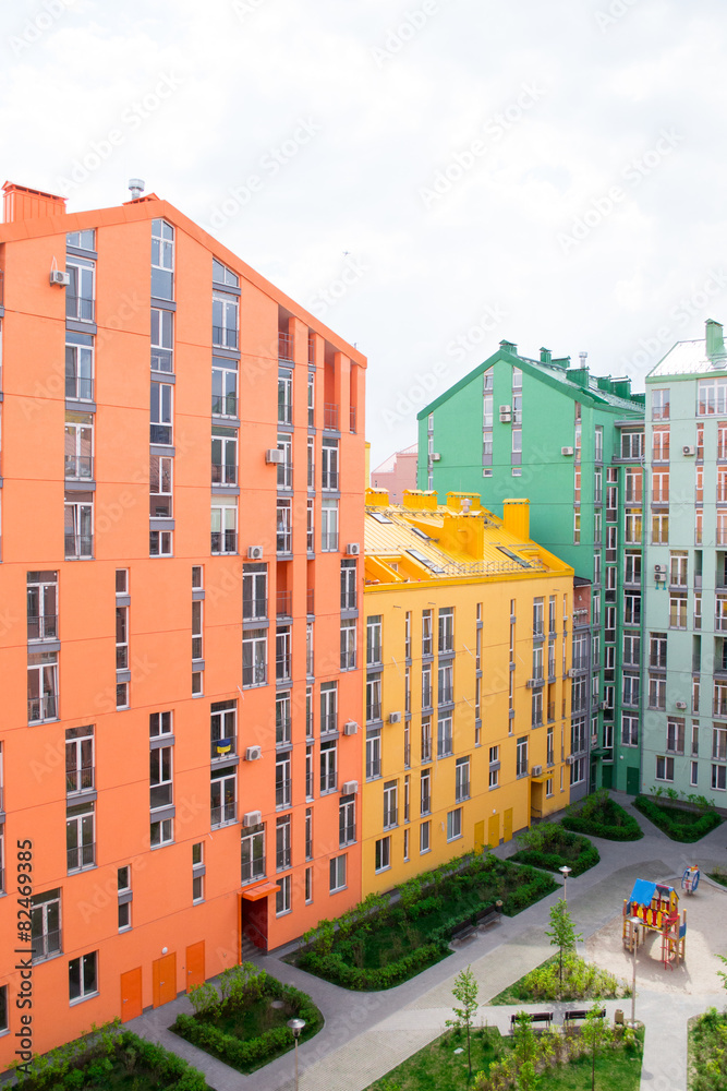 Aerial view on colorful residential buildings. Real estate and h