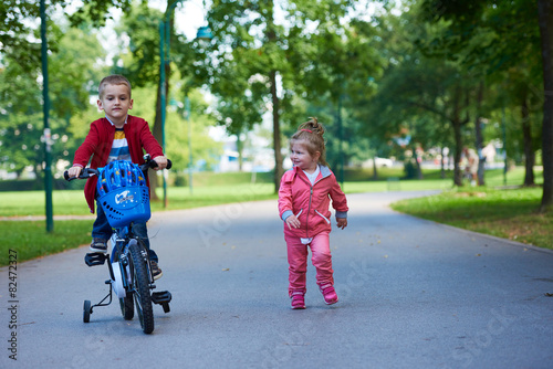 boy and girl with bicycle