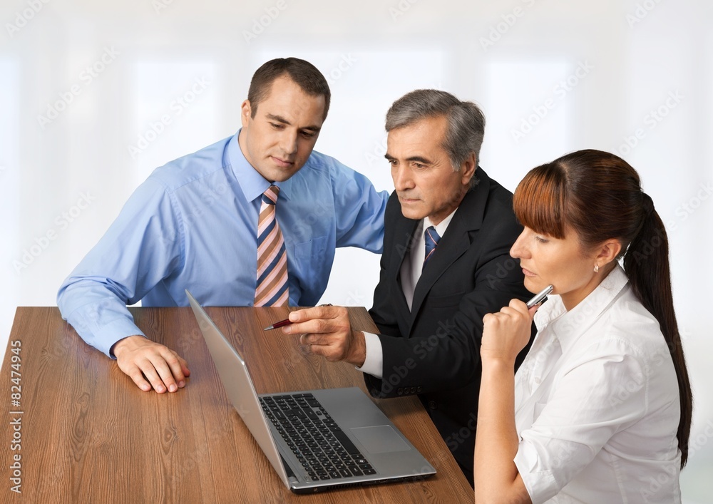 Obraz premium Business. Business colleagues working on a laptop