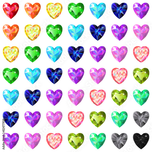 Seamless texture of colored heart cut gems isolated on white bac