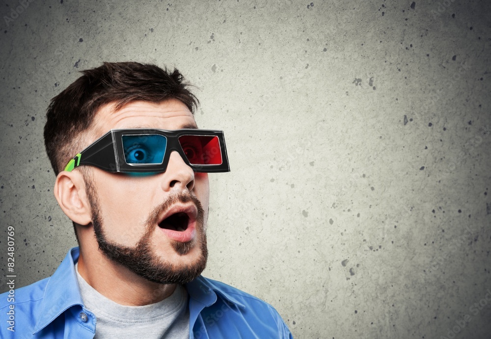 Obraz premium Glasses. Portrait of amazed man with 3d glasses