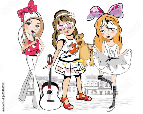 Set of three fashion little girls in the city