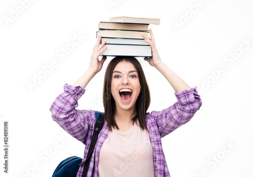 Laughing young wowan with books on head photo