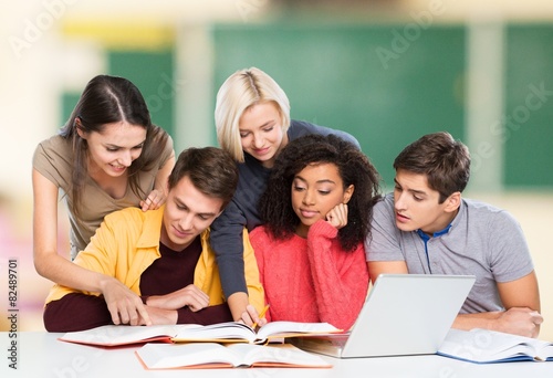 Students. Group of college students at the library