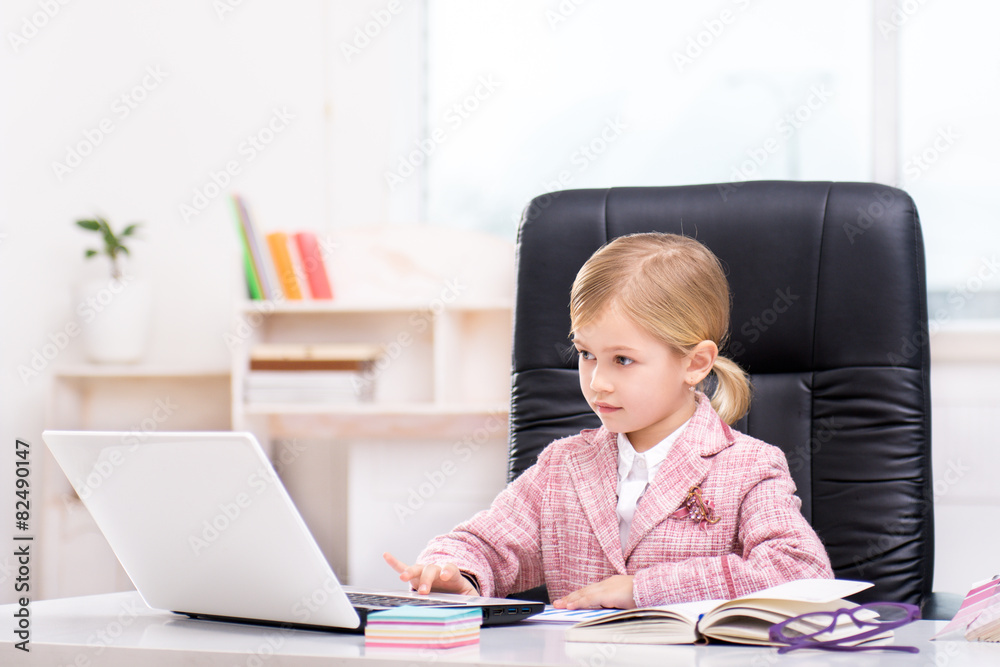 Little cute girl playing role of business woman Little cute girl playing role of business woman