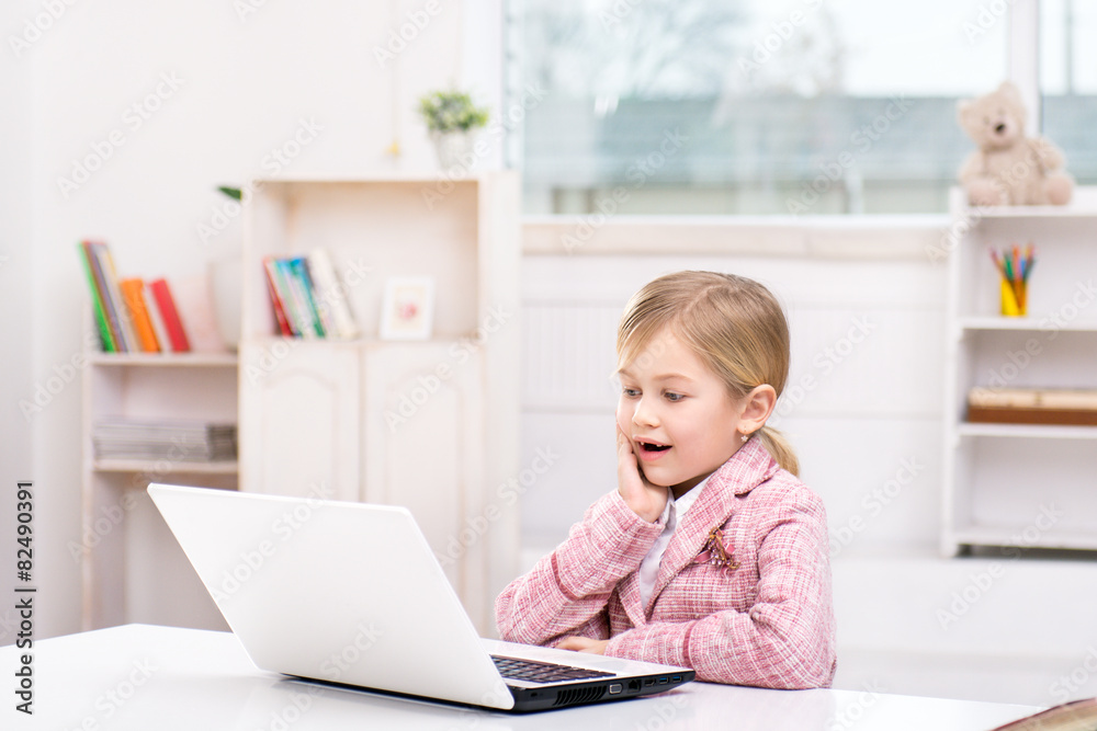 Little cute girl playing role of business woman