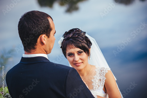 wedding: bride and groom on the seashore.
