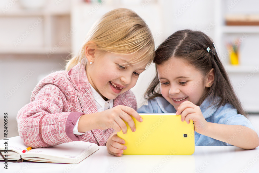 Two little cute girls playing role of business women Two little cute girls playing role of business women