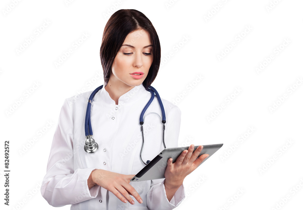 Female Doctor using a digital tablet on white background Female Doctor using a digital tablet on white background