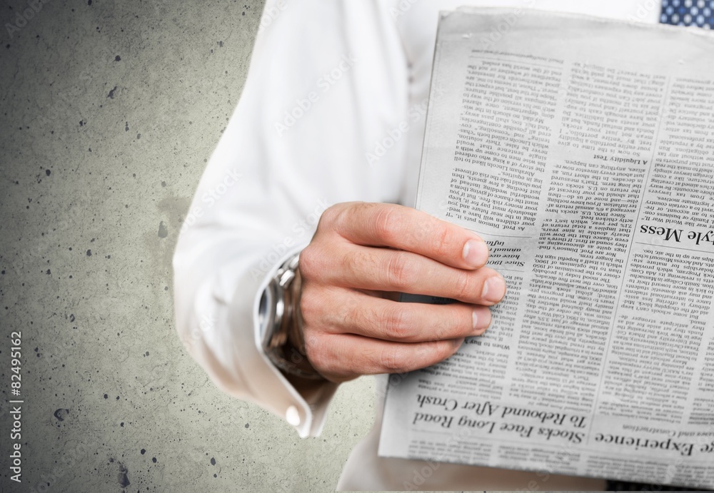 Naklejka premium Newspaper. Reading news