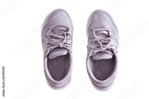 Pair of Worn White Sneakers on White Background