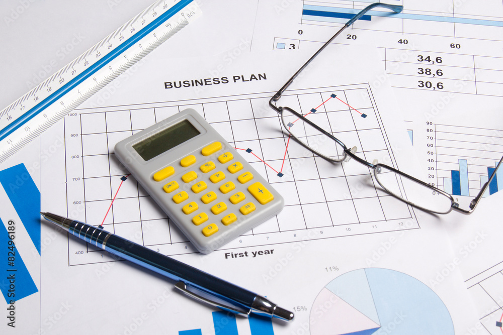 business plan with graphs, charts and calculator business plan with graphs, charts and calculator